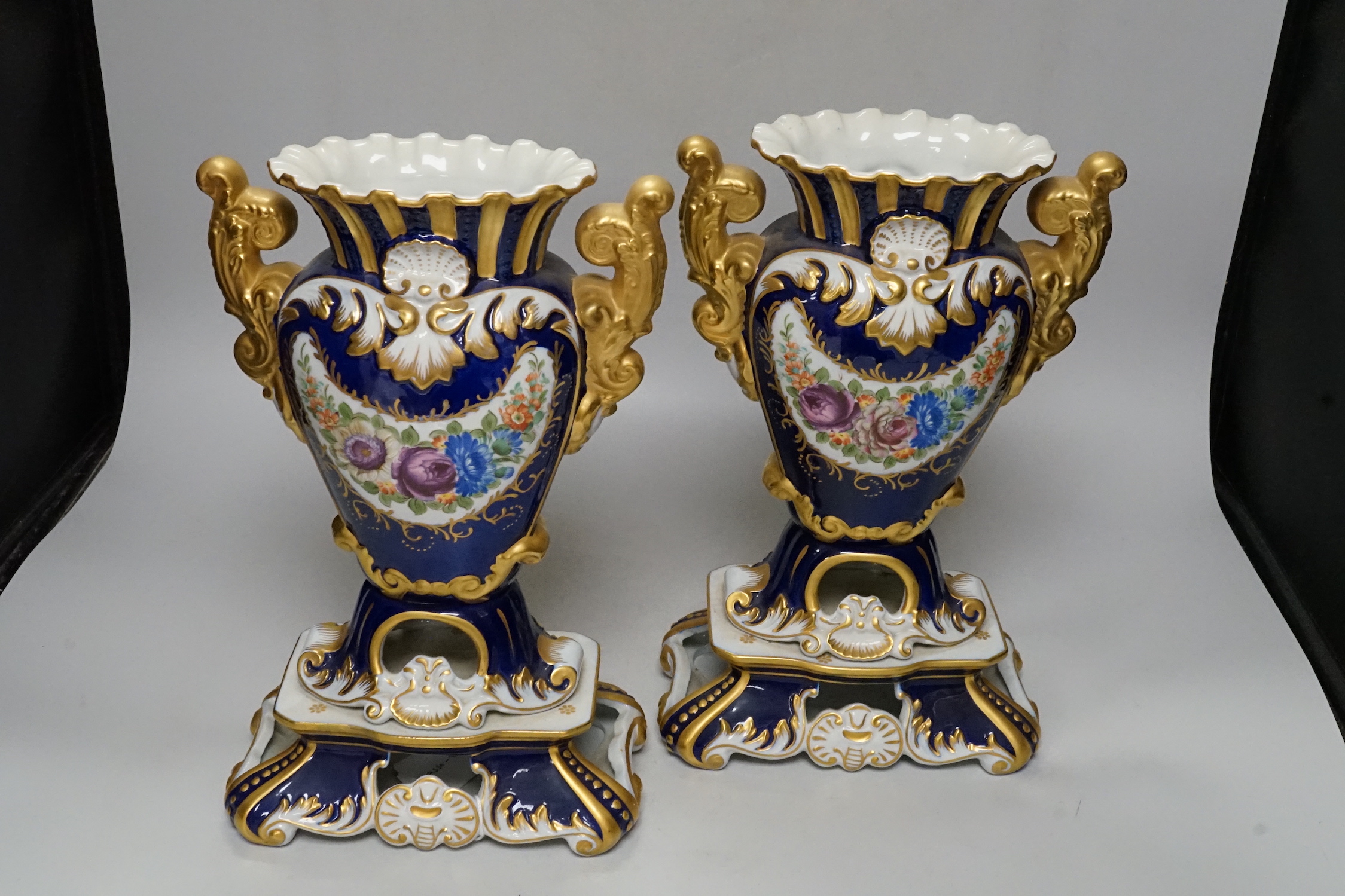 A pair of Sevres style porcelain vases, 31.5cm